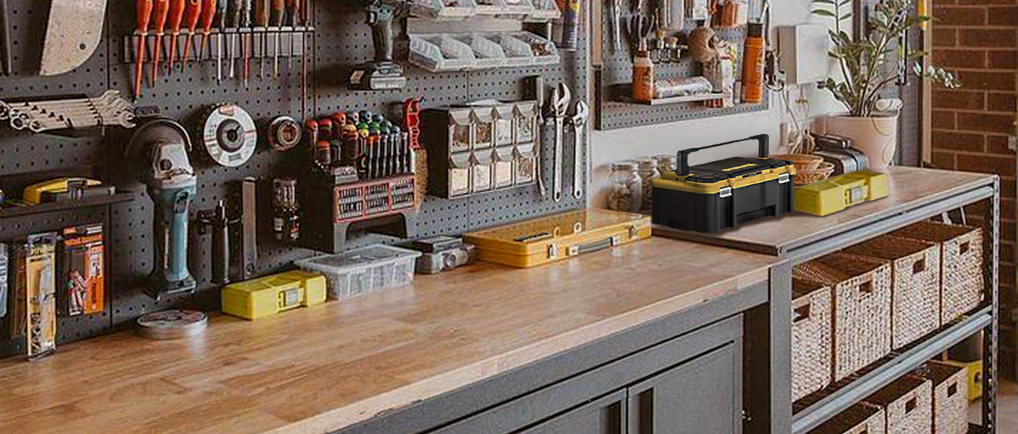 Organized workshop with wooden workbench, metal pegboard holding tools, and storage shelves. Various tools, toolboxes, and supplies neatly arranged on bench and in baskets below.