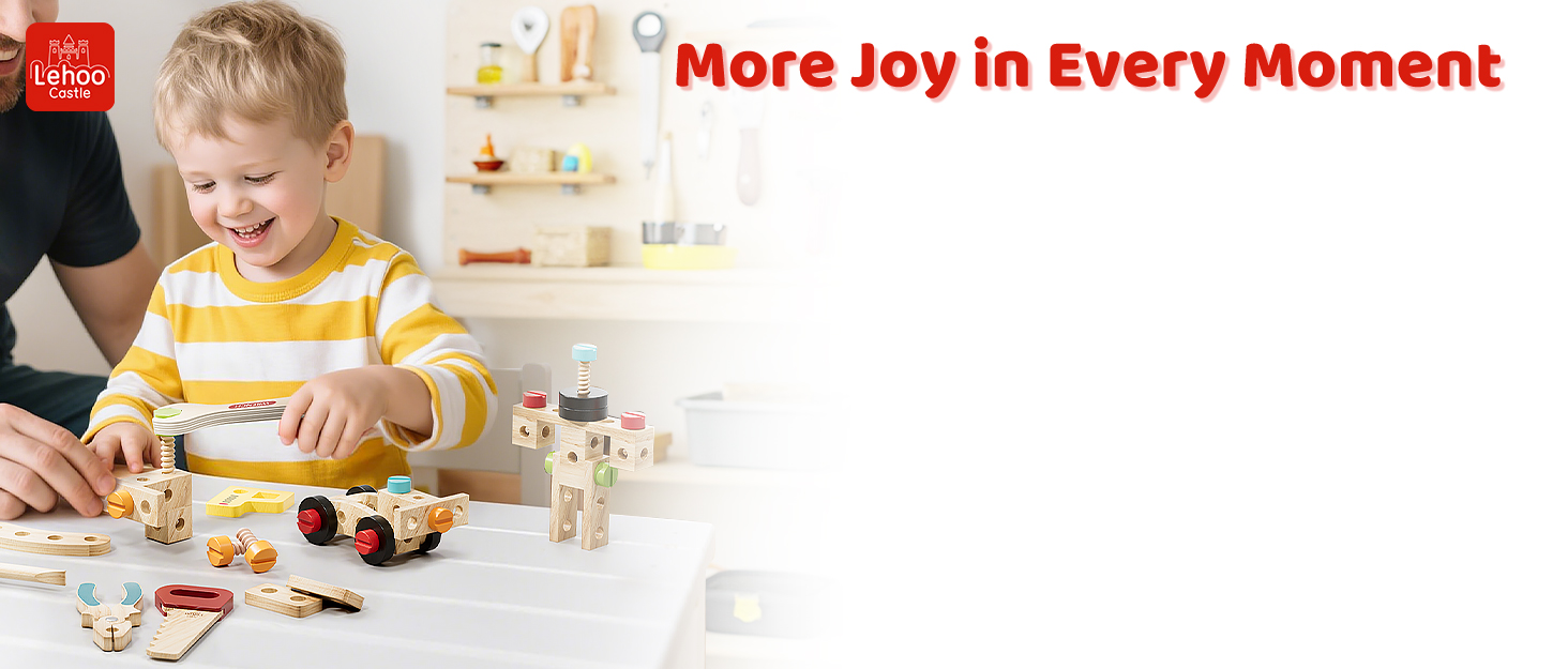 Wooden toy set on white table with child playing. Set includes blocks, animals, and vehicles. Text reads 'More Joy in Every Moment'.
